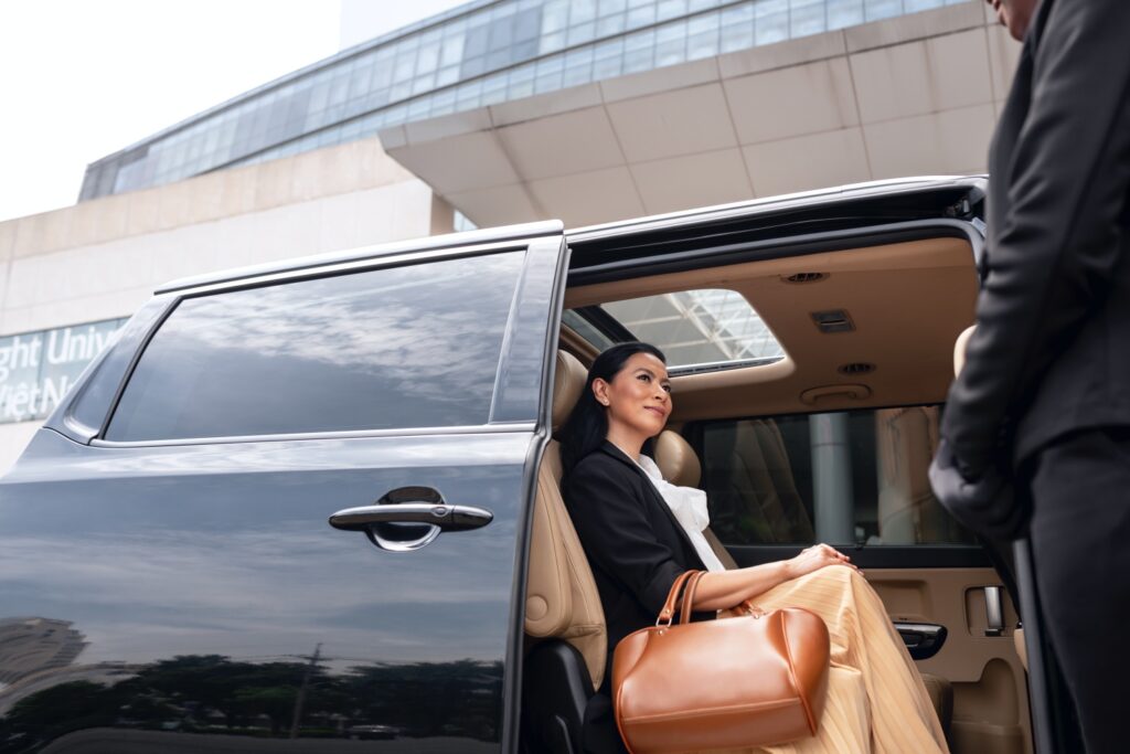 businesswoman-getting-taxi-cab